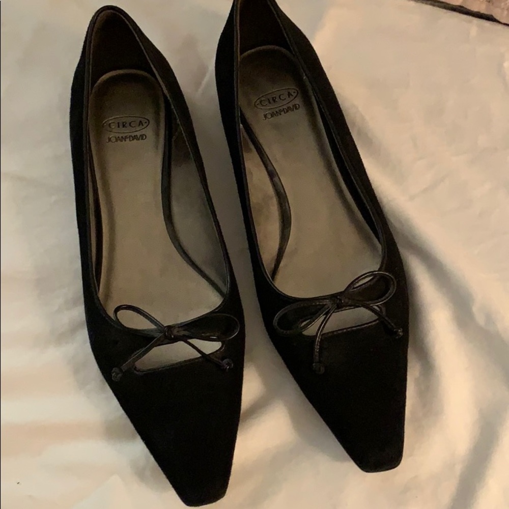 Black suede kitten heel shoes.